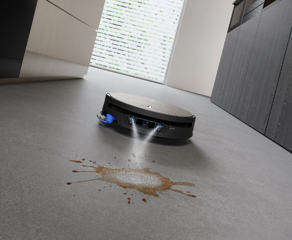 Robot sprzątający Deebot rozmiękcza trudną plamę na twardej podłodze korzystając z technologii FocusJet